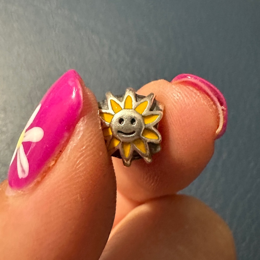 Pandora silver and yellow sun charm